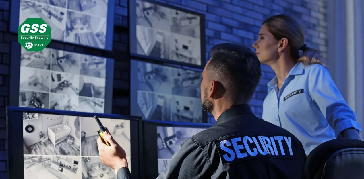 High-tech security operations center with various CCTV feeds.