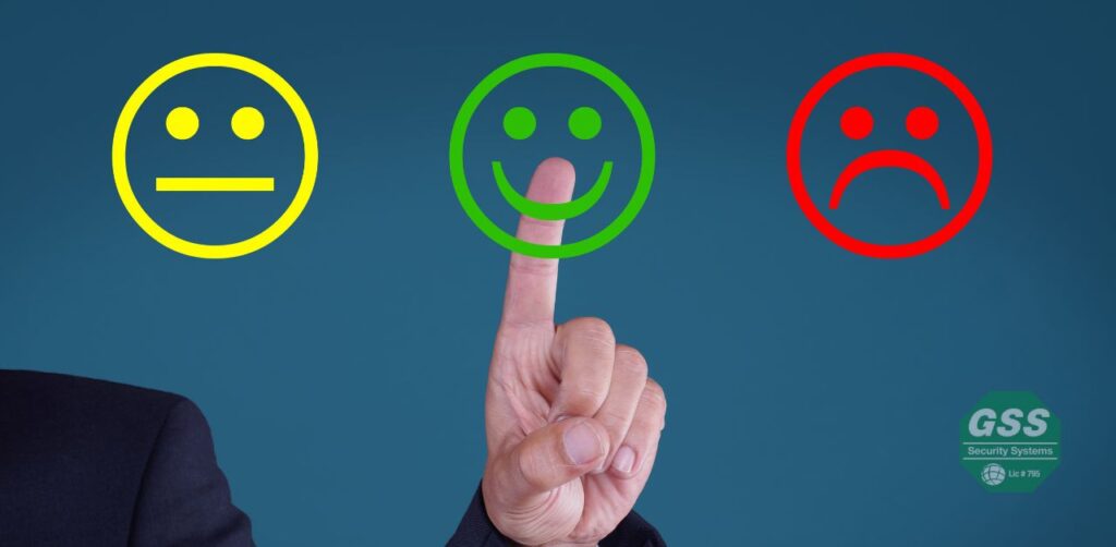 A person examining a home's entry points for potential security vulnerabilities