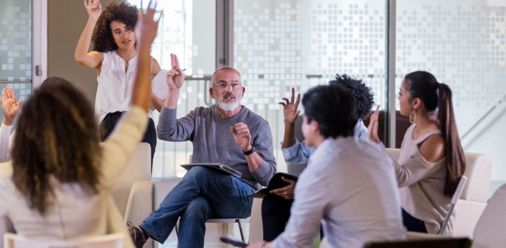 A group of neighbors discussing home security measures