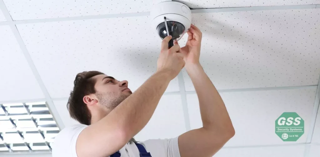 An expert installing a CCTV camera.